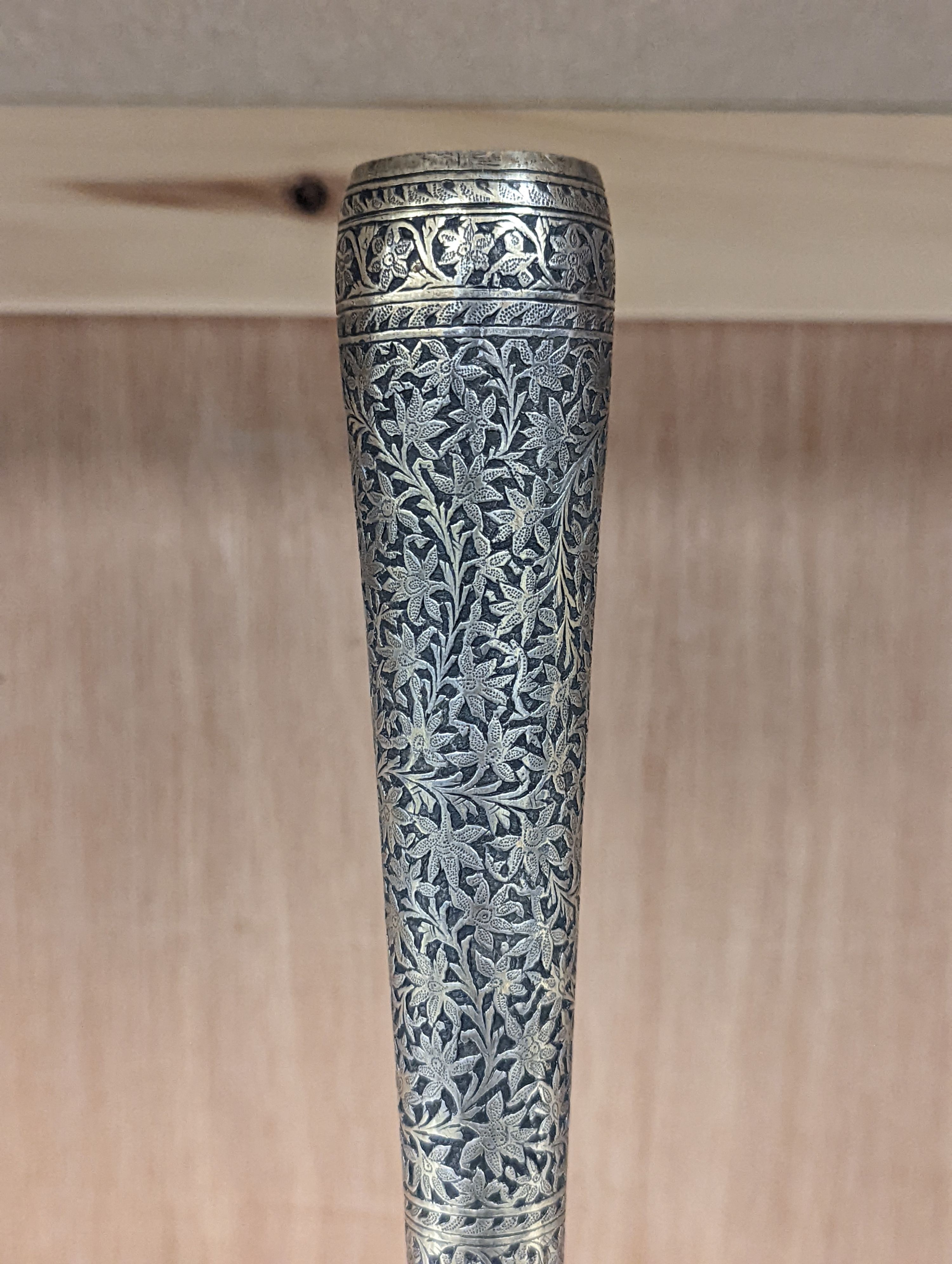 A 19th century North Indian silver surahi with engraved shawl decoration 30cm